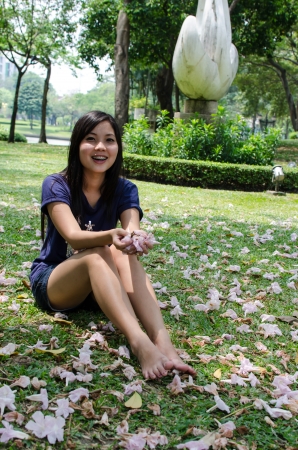 Lovely Chinese girl in the gradenの写真素材