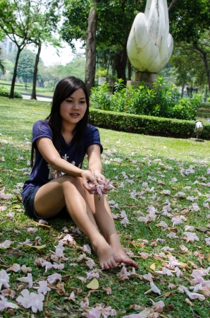 Lovely Chinese girl in the gradenの写真素材