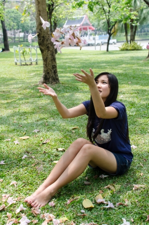 Lovely Chinese girl in the gradenの写真素材