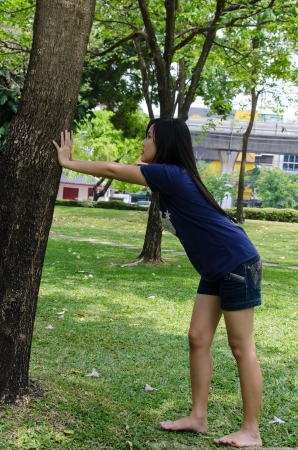 Lovely Chinese girl in the gradenの写真素材