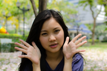 Lovely Chinese girl in the gradenの写真素材