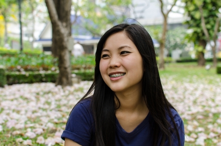 Lovely Chinese girl in the gradenの写真素材