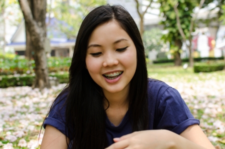 Lovely Chinese girl in the gradenの写真素材