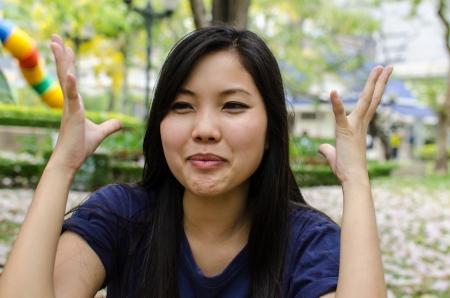 Lovely Chinese girl in the gradenの写真素材