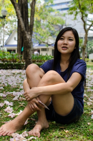 Lovely Chinese girl in the gradenの写真素材