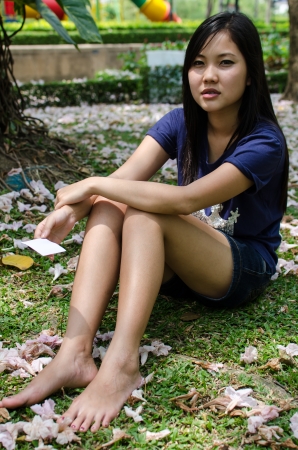 Lovely Chinese girl in the gradenの写真素材