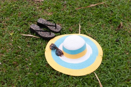 summer accessories on grass in gardenの写真素材