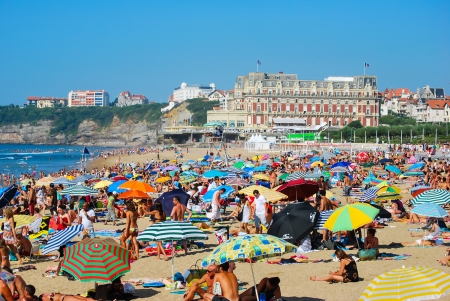 Crowded beach with tourists in summer at Biarritz, France.のeditorial素材