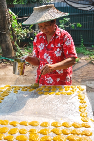The thai women making dessert made from mango, Lopburi, Thailand.のeditorial素材