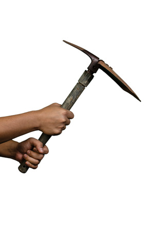 A hand holding old dirty rusty shovel isolated on white backgroundの写真素材