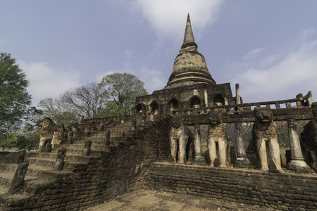 Temple surrounded by elephants is a late fourteenth Century Buddhist temple in Historic Town of Sukhothai and Associated Historic Townsの写真素材