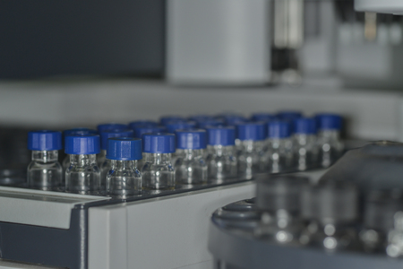 Sample vial are waiting for analysis in plastic trayの写真素材