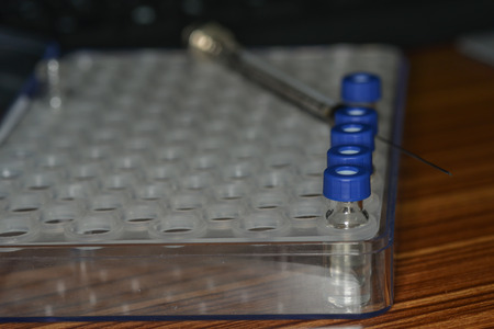 Sample vial are waiting for analysis in plastic trayの写真素材