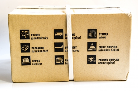 Brown wrapped parcel isolated on white backgroundの写真素材