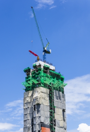 New building under construction with crane の写真素材
