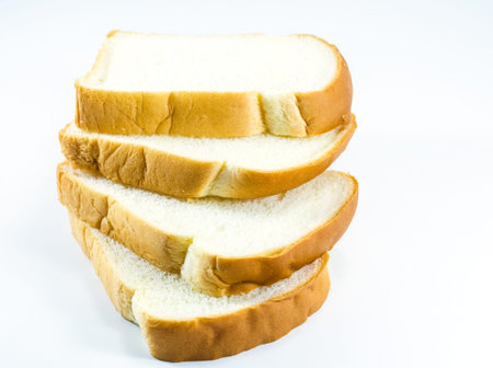 Sliced white bread on white background 