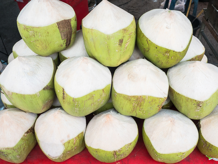 Fresh coconuts in the market.の写真素材