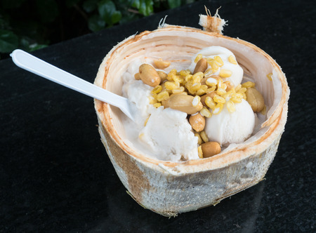 Coconut ice cream with nuts.の写真素材