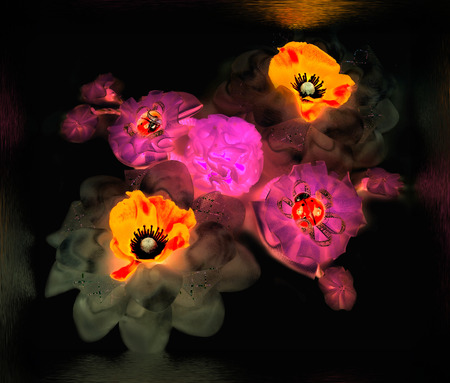 Abstraction of colorful fabric of bright colors with ladybug on black background with water reflectionsの写真素材