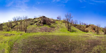 Natural spring landscape with hilly terrain in the city of Krivoy Rog in Ukraineの写真素材