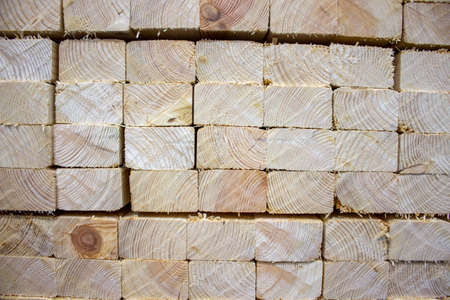 The end of a stock of pine 2x4 studs for construction of new buildingsの写真素材