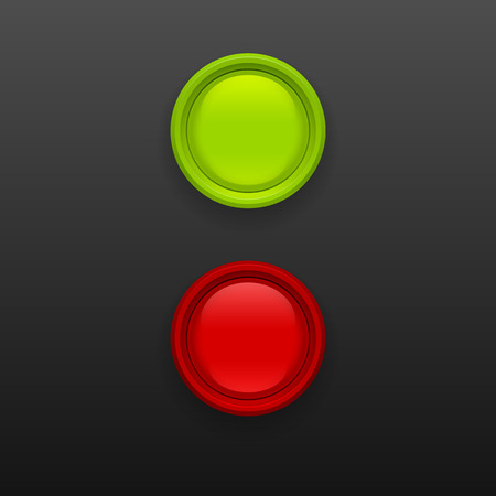 Red and green button  on black background. Glossy red and green button.