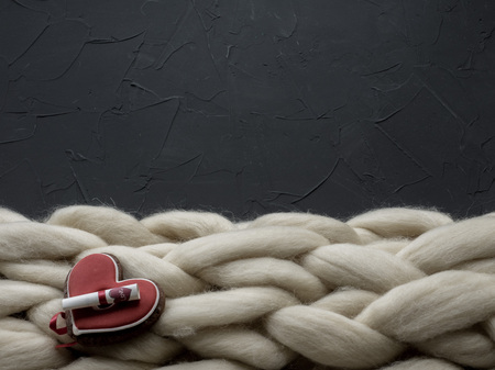 Cozy composition, closeup merino wool blanket, warm and comfortable atmosphere. Knit backgroundの写真素材