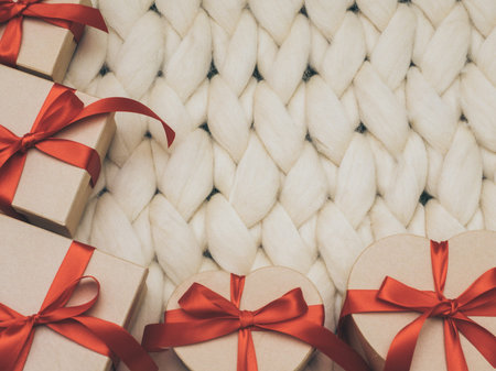 Wrapped vintage gift box. Holiday concept. Cozy compozition. Knit background.の写真素材