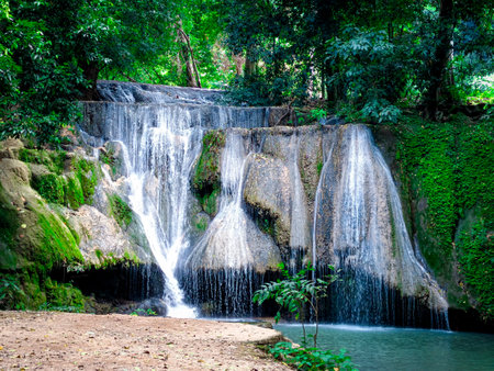 Beautiful waterfall in tropical rain forest, Thailand. Nature background.の写真素材
