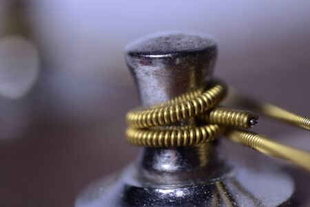 Tunner guitar string in close upの写真素材