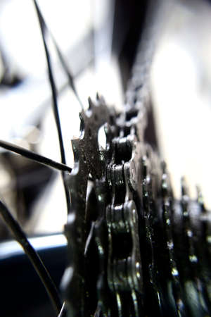 Close up of a bicycle chain and sprocket. Selective focus.の写真素材