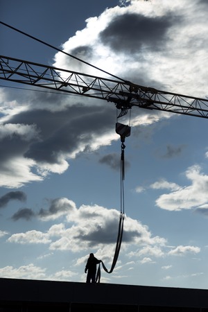 Silhouette of construction workerの写真素材
