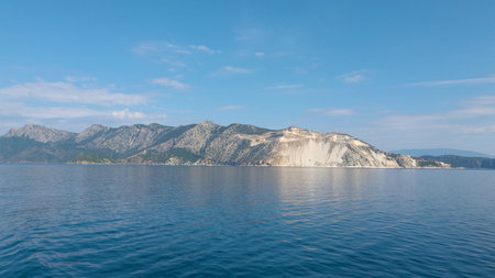 View of the mountains of an Aegean Island in Greece. Shooting from water.