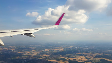 Aerial view from the window on an airplaneの写真素材