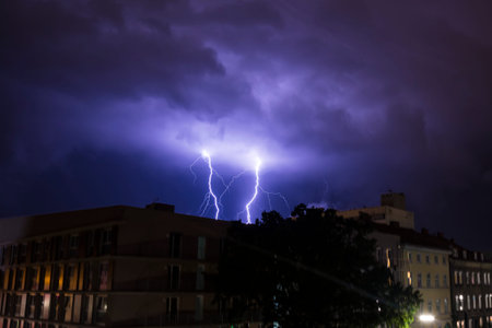 Lighning bolt over night sky in central Europe, Austria.