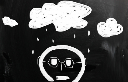 business ideas handwritten with white chalk on a blackboard.の写真素材