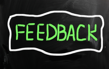 Business ideas handwritten with white chalk on a blackboard.の写真素材