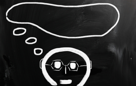 Business ideas handwritten with white chalk on a blackboard.の写真素材