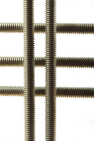 Array of long screws on a white backgroundの写真素材