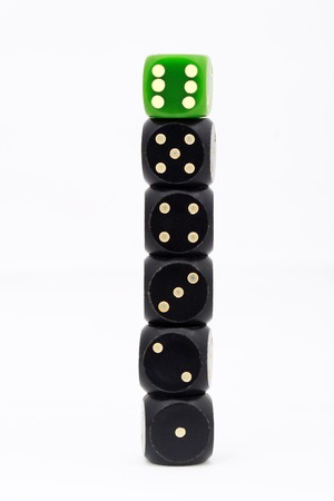 Dice tower close-up on a white backgroundの写真素材