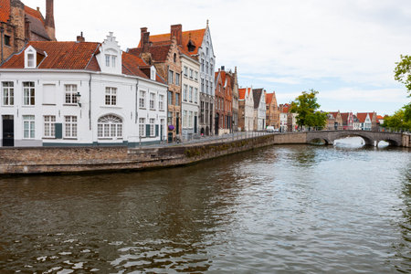 Langerei Canal winding through town of Brugge, Bruges, Belgiumの写真素材