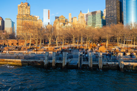 The Battery (Battery Park), New York City, USA - December 27, 2013 : Passengers waiting for ferry...