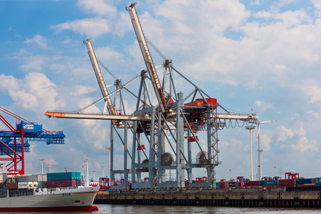 Hamburg, Germany - July 12, 2011 : Docks at Hamburg Harbor. Cargo and shipping industry on south...
