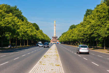 Berlin, Germany - July 7, 2011 : Strasse des 17 Juni westwards towards the Seigessaule. Major road running through Tiergarten past the Victory Column.のeditorial素材