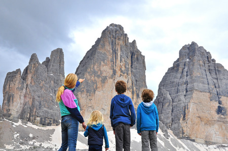Family at mountain range in Dolomites, Italyの写真素材