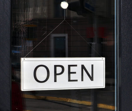 Black and white open sign