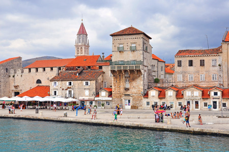 TROGIR, CROATIA - AUGUST 25: View of promenade in Trogir on August 25, 2012. Trogir is a historic town and harbour on the Adriatic coast in Split-Dalmatia County, Croatia.のeditorial素材