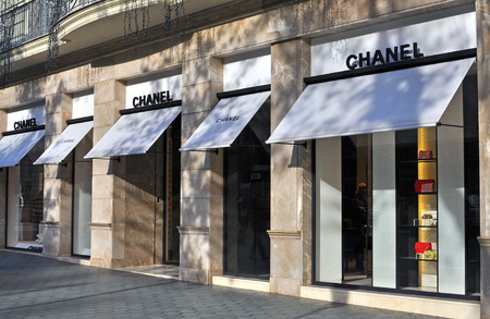 BARCELONA, SPAIN - DECEMBER 8: Facade of Chanel flagship store in the street of Barcelona on December 8, 2014. Chanel is a luxurious clothing brand based in France.のeditorial素材