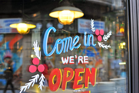 Open sign in the street cafe