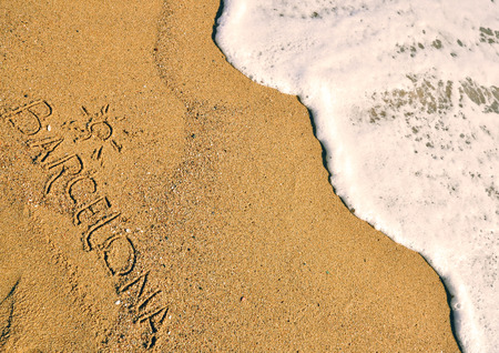 Barcelona sign on the beachの写真素材